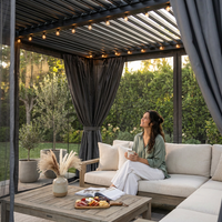 10' X 12' Louvered Pergola, Aluminum Frame Outdoor Pergola with Curtains & Netting, Adjustable Louvered Roof & Integrated Gutter System, Hardtop Patio Gazebo for Backyard, Patio, Garden, Dark Gray — Lifestyle